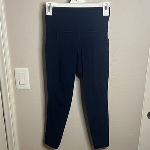 Athleta Navy Salutation 7/8 Tight Leggings